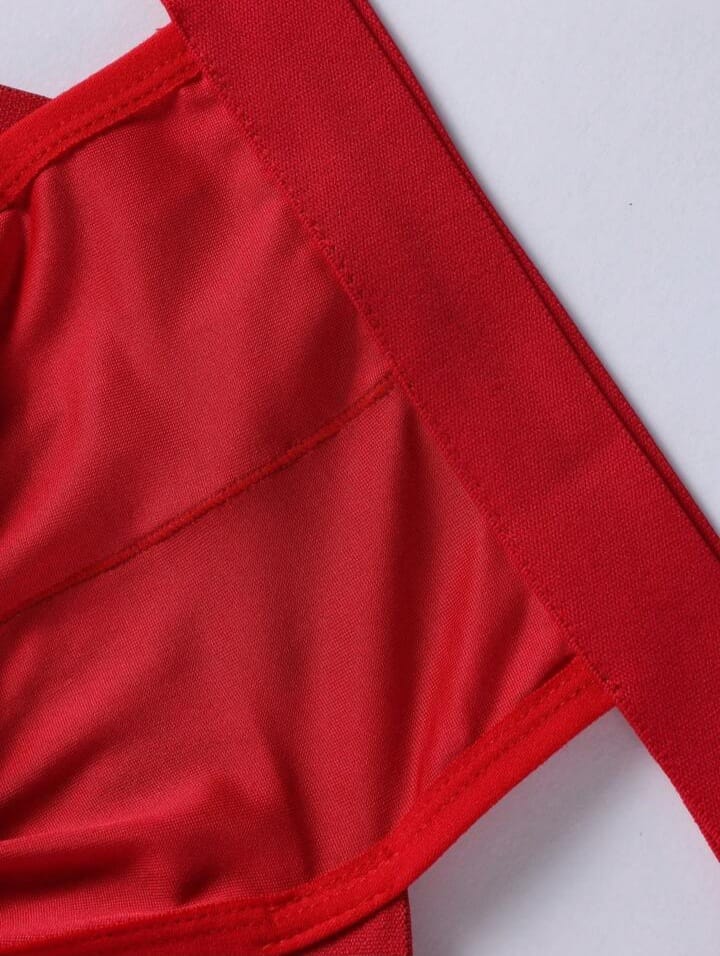 Red cage brief with contour pouch.